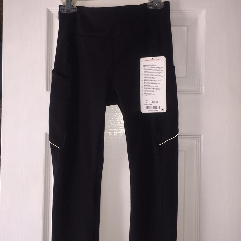 Brand NEW Speed Up Crop BLK size 4